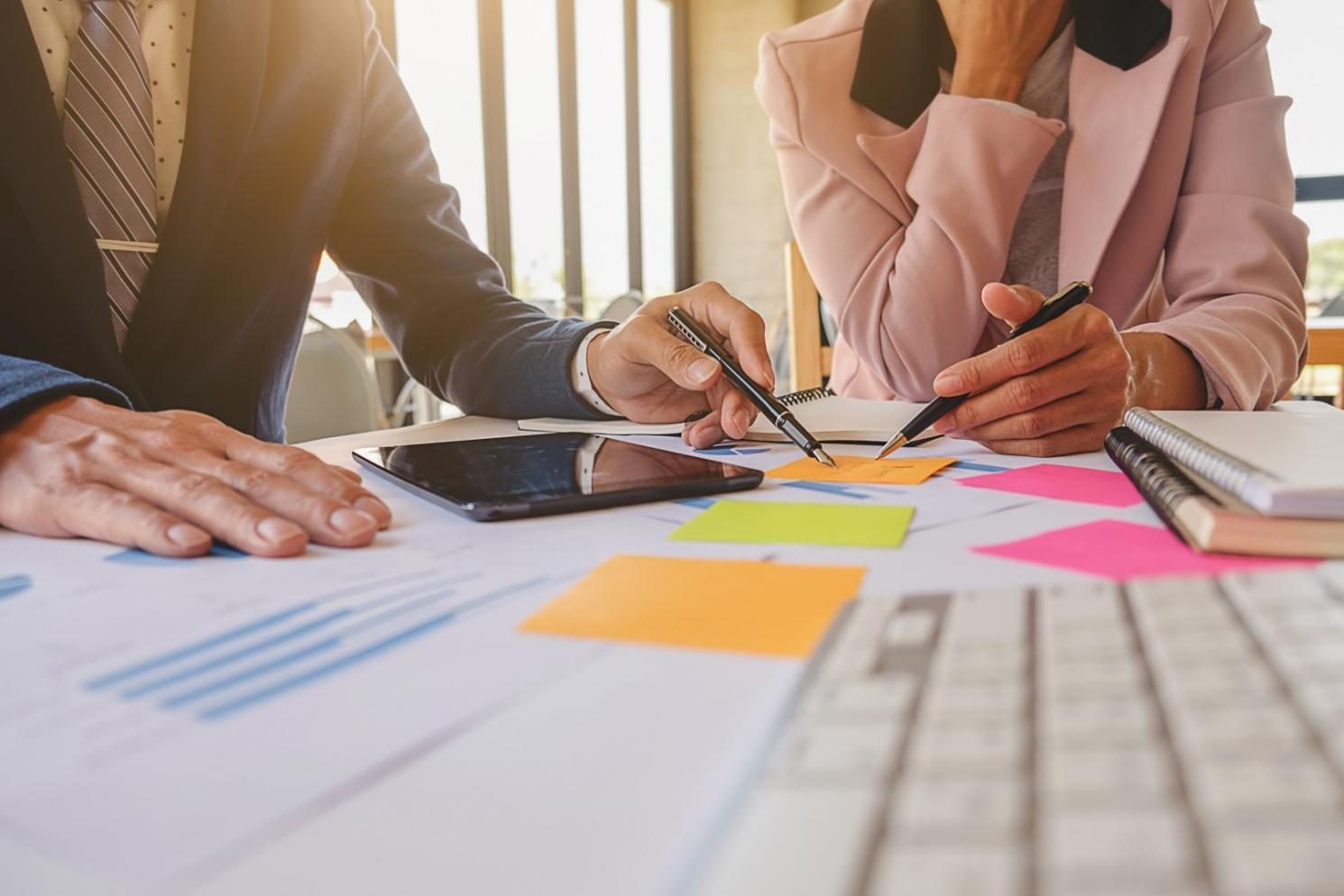 Detailed financial analysis on computer screen showing trend graphs